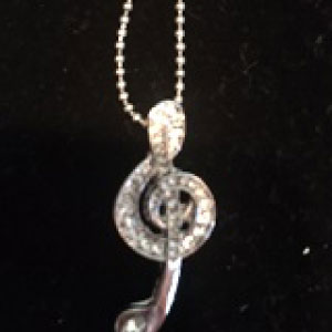 Long Stemmed Treble Clef With Stones Necklace